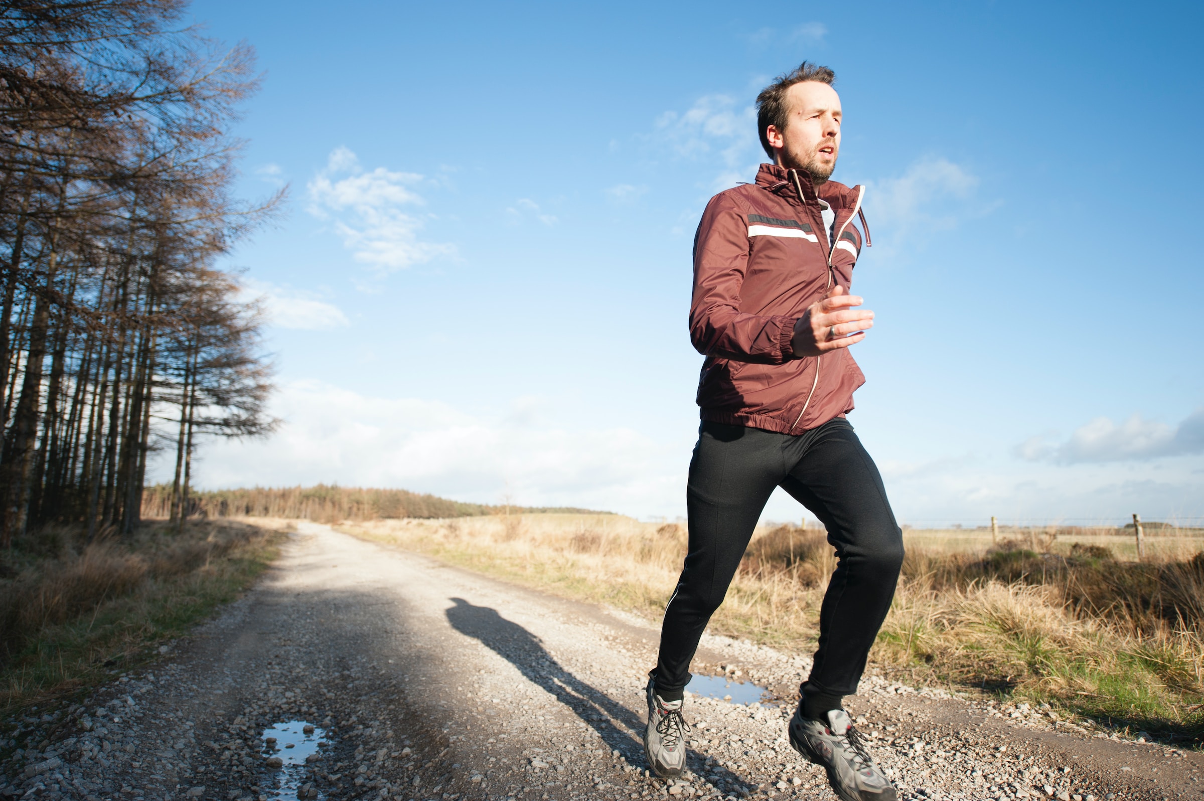 Person jogging outdoors demonstrating healthy lifestyle